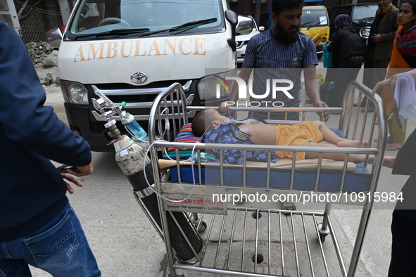 A baby is receiving treatment for pneumonia inside Dhaka Child Hospital during the winter season in Dhaka, Bangladesh, on January 15, 2024. 