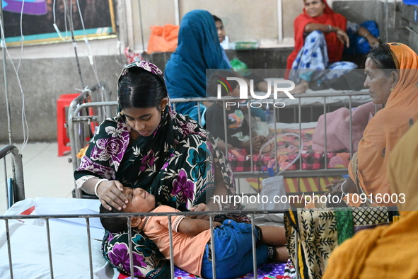 Child patients are being admitted to the Dhaka child hospital for treatment with their guardians as they are suffering from cold-related ill...