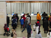 Patients are making appointments, paying fees, and collecting medicine at a hospital in Shanghai, China, on January 16, 2024. (