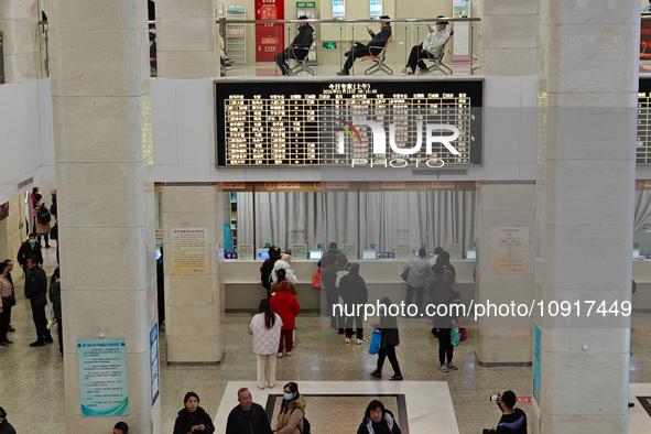 Patients are making appointments, paying fees, and collecting medicine at a hospital in Shanghai, China, on January 16, 2024. 