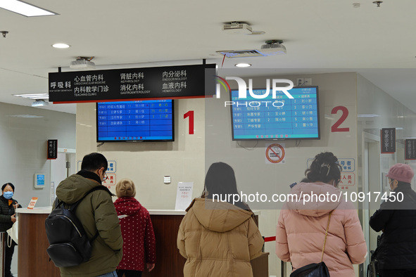 Patients are making appointments, paying fees, and collecting medicine at a hospital in Shanghai, China, on January 16, 2024. 