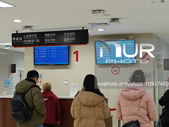 Patients are making appointments, paying fees, and collecting medicine at a hospital in Shanghai, China, on January 16, 2024. (