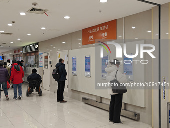 Patients are making appointments, paying fees, and collecting medicine at a hospital in Shanghai, China, on January 16, 2024. (