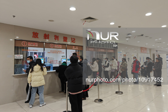 Patients are making appointments, paying fees, and collecting medicine at a hospital in Shanghai, China, on January 16, 2024. 