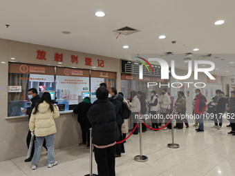 Patients are making appointments, paying fees, and collecting medicine at a hospital in Shanghai, China, on January 16, 2024. (