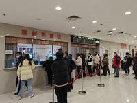 Patients are making appointments, paying fees, and collecting medicine at a hospital in Shanghai, China, on January 16, 2024. (