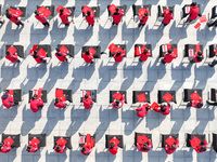 Teachers and students are writing the Chinese New Year couplet ''Fu'' at Shangbai Primary School in Deqing County, Huzhou, China, on January...