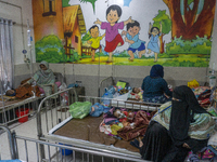 Children are receiving medical treatment for pneumonia at Dhaka Shishu Hospital in Dhaka, Bangladesh, on January 17, 2024. (