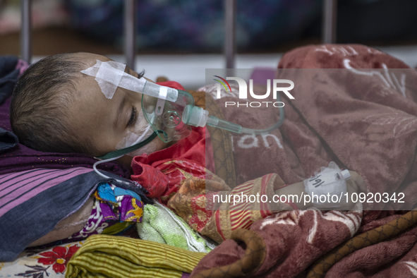 A child is receiving medical treatment for pneumonia at Dhaka Shishu Hospital in Dhaka, Bangladesh, on January 17, 2024. 