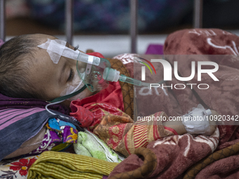 A child is receiving medical treatment for pneumonia at Dhaka Shishu Hospital in Dhaka, Bangladesh, on January 17, 2024. (