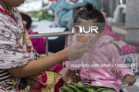 A child is receiving medical treatment for pneumonia at Dhaka Shishu Hospital in Dhaka, Bangladesh, on January 17, 2024. 