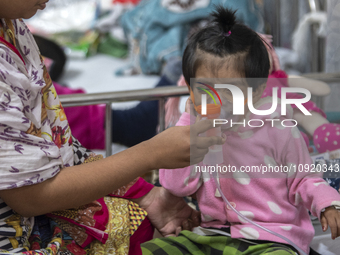 A child is receiving medical treatment for pneumonia at Dhaka Shishu Hospital in Dhaka, Bangladesh, on January 17, 2024. (