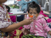 A child is receiving medical treatment for pneumonia at Dhaka Shishu Hospital in Dhaka, Bangladesh, on January 17, 2024. (