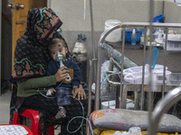 A child is receiving medical treatment for pneumonia at Dhaka Shishu Hospital in Dhaka, Bangladesh, on January 17, 2024. (