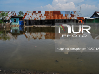 The Sicanang leprosy settlement in Medan, North Sumatra Province, Indonesia, is being impacted by tidal floods on July 3, 2012. The World He...