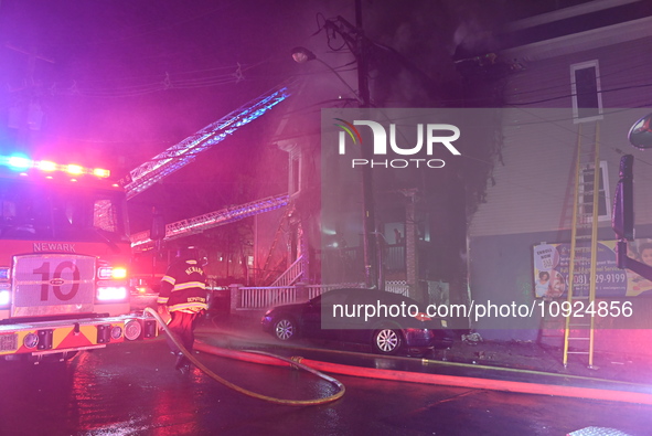 Fire is affecting several buildings on West Bigelow Street in Newark, New Jersey, United States, on January 19, 2024. One firefighter has re...