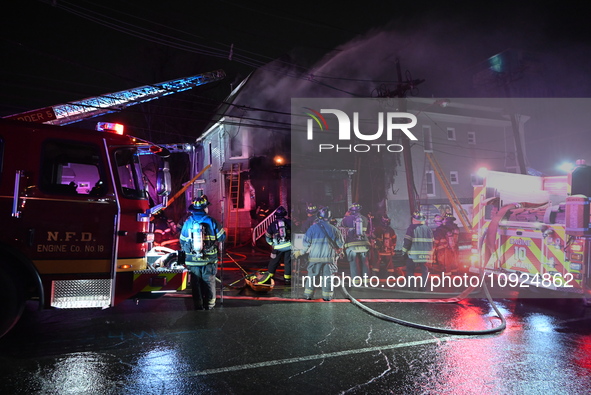 Fire is affecting several buildings on West Bigelow Street in Newark, New Jersey, United States, on January 19, 2024. One firefighter has re...