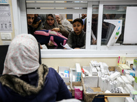 A UNRWA employee is providing a Polio vaccine in a clinic in Deir al-Balah, central Gaza Strip, on January 21, 2024, amid ongoing battles be...