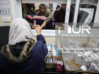 A UNRWA employee is providing a Polio vaccine in a clinic in Deir al-Balah, central Gaza Strip, on January 21, 2024, amid ongoing battles be...