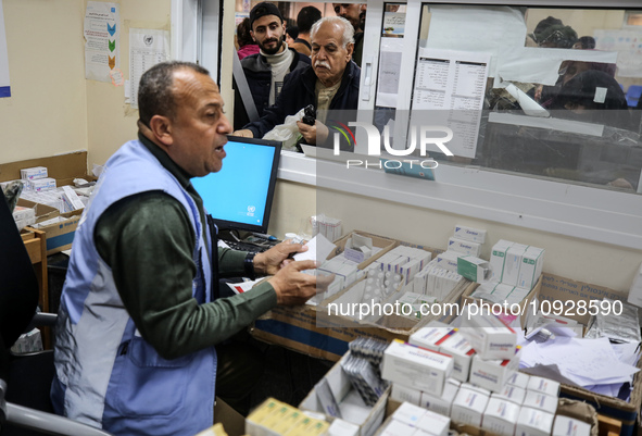 A UNRWA employee is providing a Polio vaccine in a clinic in Deir al-Balah, central Gaza Strip, on January 21, 2024, amid ongoing battles be...