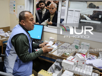 A UNRWA employee is providing a Polio vaccine in a clinic in Deir al-Balah, central Gaza Strip, on January 21, 2024, amid ongoing battles be...