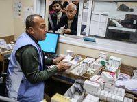 A UNRWA employee is providing a Polio vaccine in a clinic in Deir al-Balah, central Gaza Strip, on January 21, 2024, amid ongoing battles be...