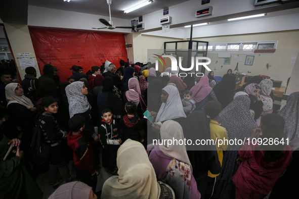 A UNRWA employee is providing a Polio vaccine in a clinic in Deir al-Balah, central Gaza Strip, on January 21, 2024, amid ongoing battles be...