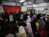 A UNRWA employee is providing a Polio vaccine in a clinic in Deir al-Balah, central Gaza Strip, on January 21, 2024, amid ongoing battles be...