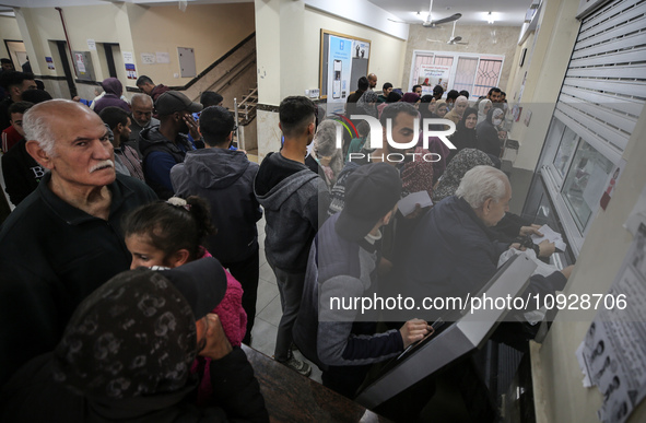 A UNRWA employee is providing a Polio vaccine in a clinic in Deir al-Balah, central Gaza Strip, on January 21, 2024, amid ongoing battles be...