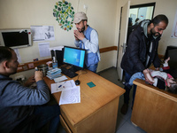 A UNRWA employee is providing a Polio vaccine in a clinic in Deir al-Balah, central Gaza Strip, on January 21, 2024, amid ongoing battles be...