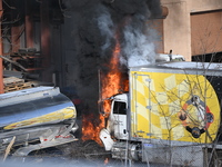 A box truck is catching fire at a warehouse on Marshall Street in Paterson, New Jersey, United States, on January 22, 2024. Authorities are...