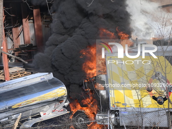 A box truck is catching fire at a warehouse on Marshall Street in Paterson, New Jersey, United States, on January 22, 2024. Authorities are...