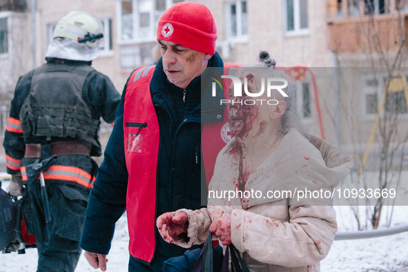 An elderly woman is being accompanied by a medical worker after suffering from shelling, in Kharkiv, Ukraine, on January 23, 2024. On The Mo...