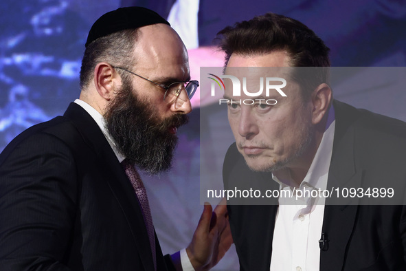 Elon Musk, owner of Tesla and the X (formerly Twitter) platform and EJA Chairman Rabbi Menachem Margolin attend a symposium on fighting anti...