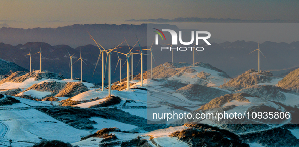 An aerial photo is showing a wind farm operating steadily on a barren mountain in Yichang, China, on January 24, 2024. 