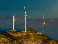 An aerial photo is showing a wind farm operating steadily on a barren mountain in Yichang, China, on January 24, 2024. (