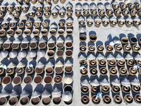 Workers are checking the drying of sauces in a drying field at a soy sauce factory in Lianyungang, Jiangsu Province, China, on January 24, 2...