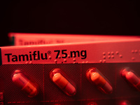 A box and a tablet of Roche Pharmaceuticals' Tamiflu pills for influenza are shown. (