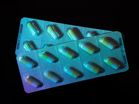 Two tablets of Roche Pharmaceuticals' Tamiflu are being shown. (