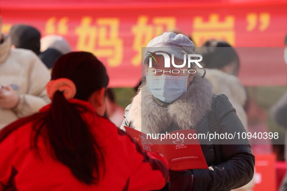 Job seekers are consulting at a job fair in Hefei, China, on January 26, 2024. 