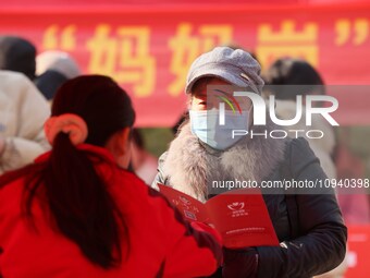 Job seekers are consulting at a job fair in Hefei, China, on January 26, 2024. (