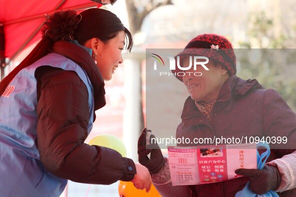 Job seekers are consulting at a job fair in Hefei, China, on January 26, 2024. 