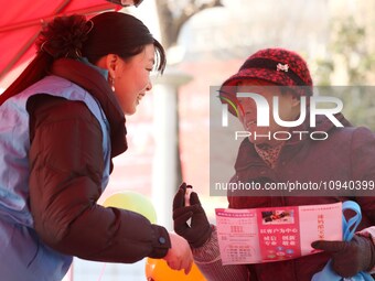 Job seekers are consulting at a job fair in Hefei, China, on January 26, 2024. (