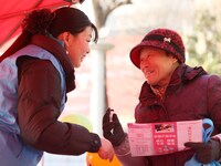 Job seekers are consulting at a job fair in Hefei, China, on January 26, 2024. (