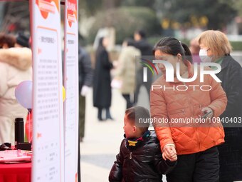 Job seekers are consulting at a job fair in Hefei, China, on January 26, 2024. (