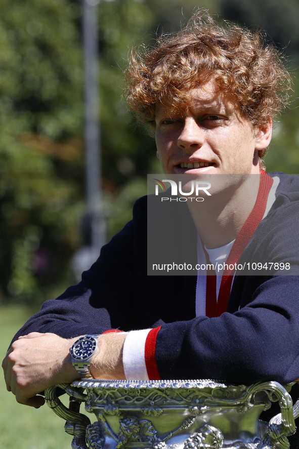 Jannik Sinner of Italy is posing with the Norman Brookes Challenge Cup after winning the 2024 Australian Open Final at the Royal Botanic Gar...