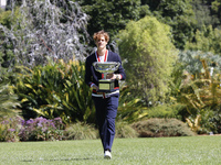 Jannik Sinner of Italy is posing with the Norman Brookes Challenge Cup after winning the 2024 Australian Open Final at the Royal Botanic Gar...