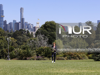 Jannik Sinner of Italy is posing with the Norman Brookes Challenge Cup after winning the 2024 Australian Open Final at the Royal Botanic Gar...