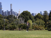 Jannik Sinner of Italy is posing with the Norman Brookes Challenge Cup after winning the 2024 Australian Open Final at the Royal Botanic Gar...