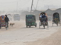 People Make Their Move In A Dusty Busy Road In Dhaka City, Bangladesh, On January 30, 2024. Dhaka City's Air Was Classified As 'very Unhealt...